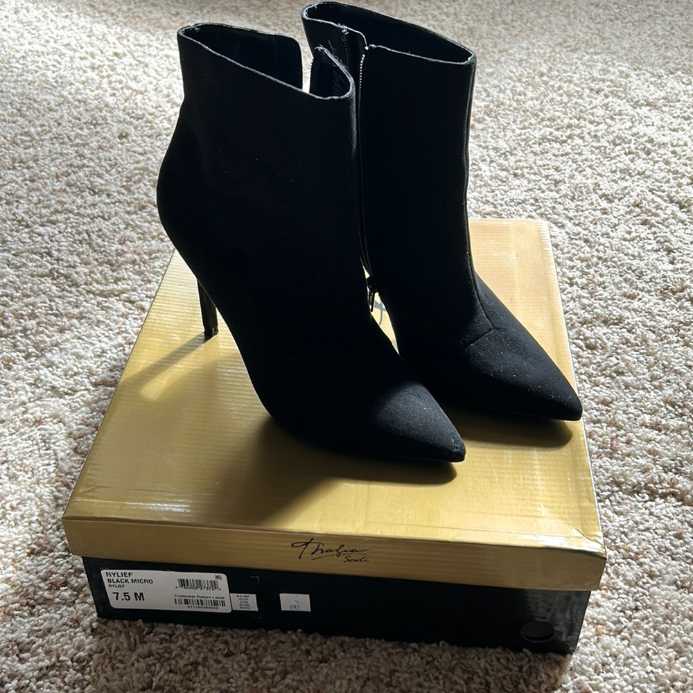 Black suede pointed toe shoes in like new condition